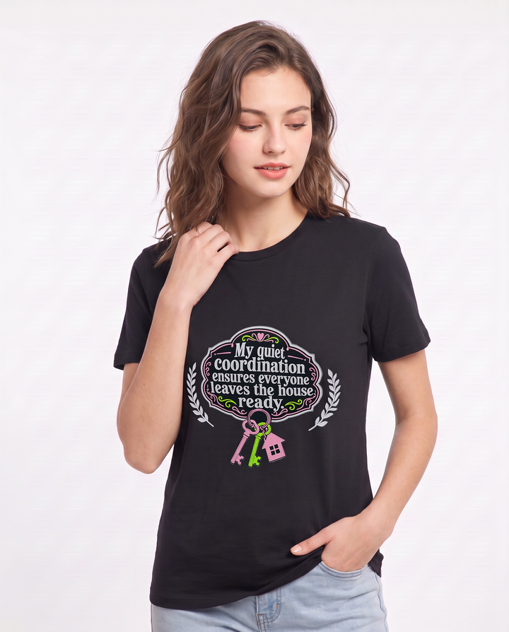 My quiet coordination ensures everyone leaves the house ready. Women's Black T-Shirt product image 1