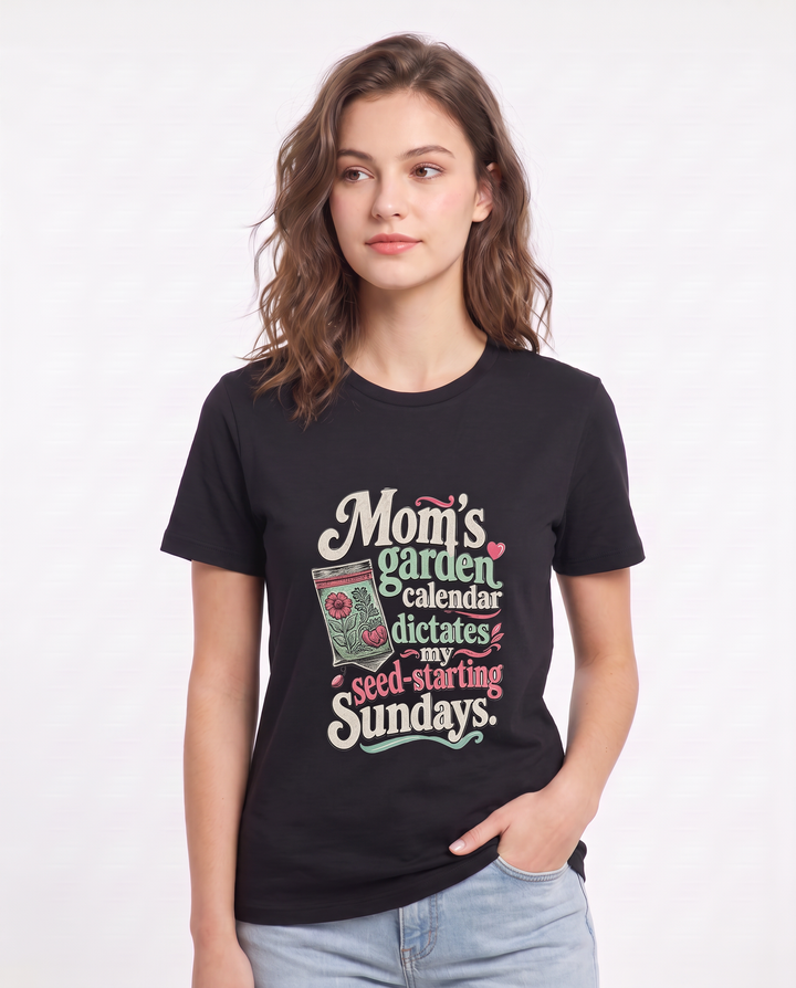 Mom's garden calendar dictates my seed-starting Sundays. Women's Black T-Shirt product image 1