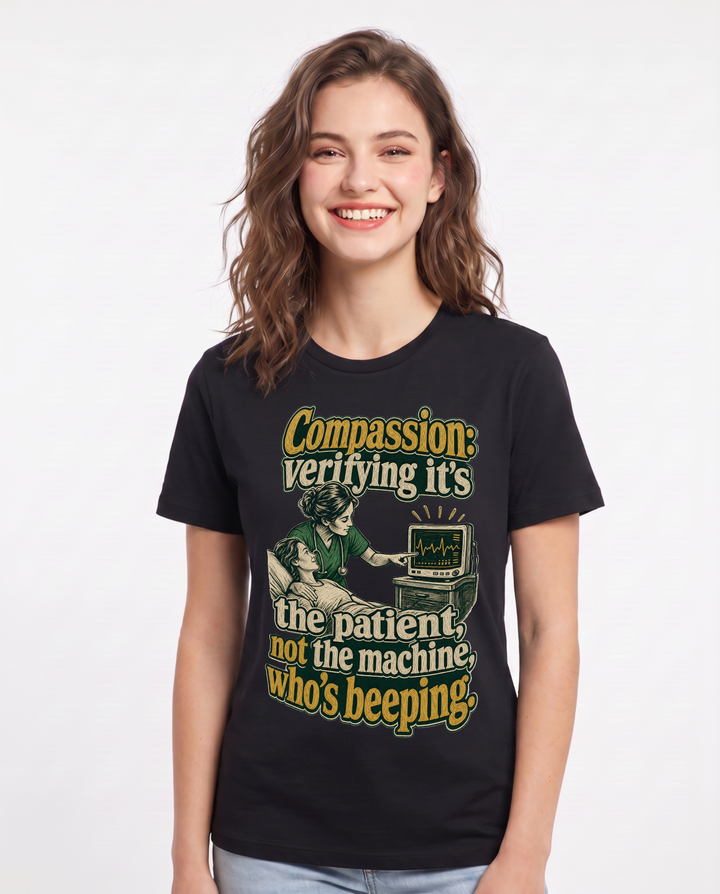 Nurse Women's Black T-Shirt – Compassion: verifying it's the patient, not the machine, who's beeping. product image 1