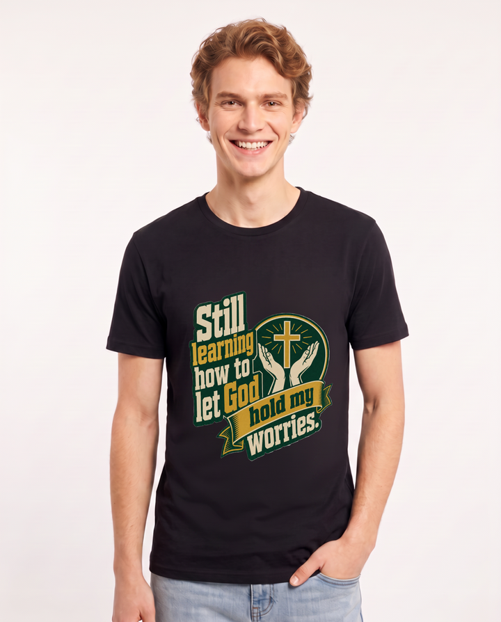 Graphic Men's Black T-Shirt - Still learning how to let God hold my product image 1