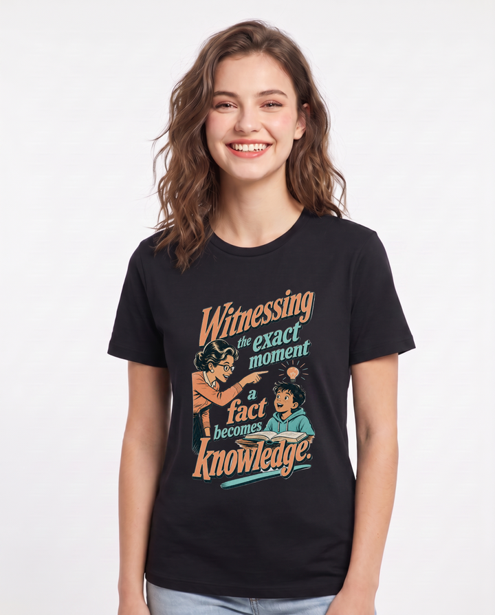 Teacher Women's Black T-Shirt – Witnessing the exact moment a fact becomes knowledge. product image 1