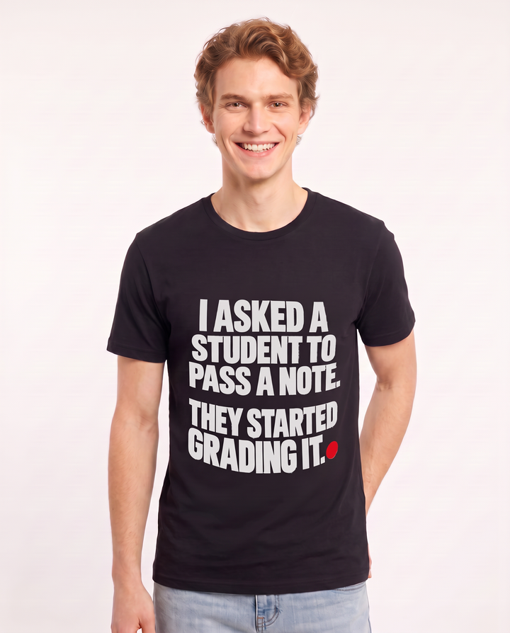 I asked a student to pass a note. They started grading it. Men's Black T-Shirt product image 1