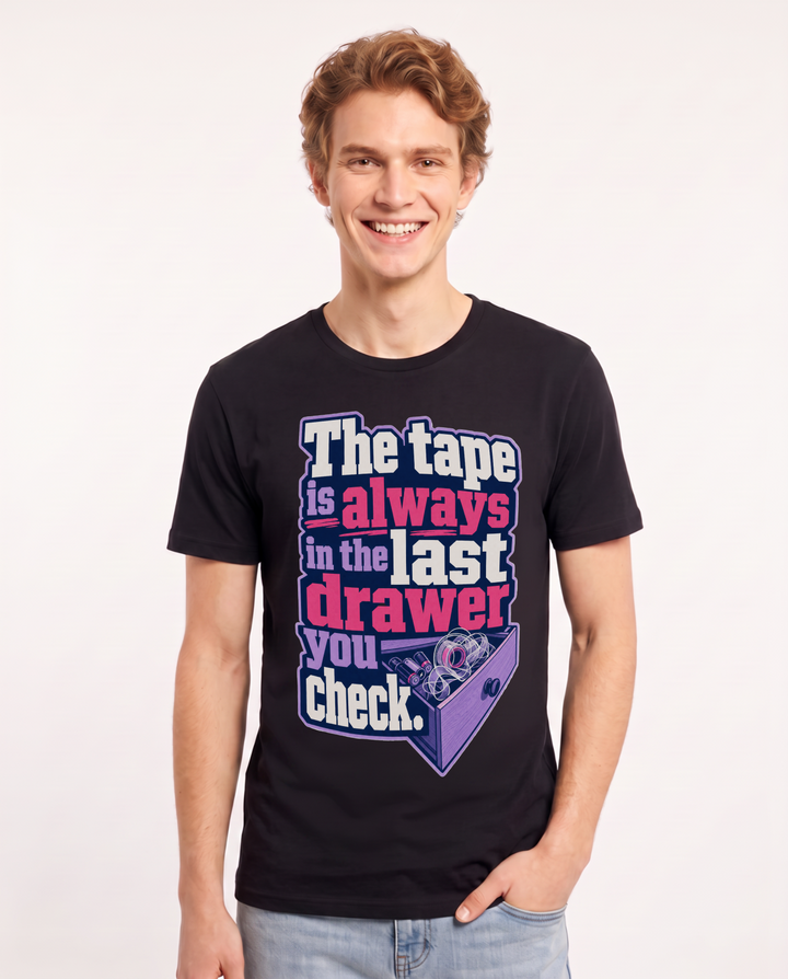 Funny Christmas Men's Black T-Shirt – The tape is always in the last drawer you check. product image 1