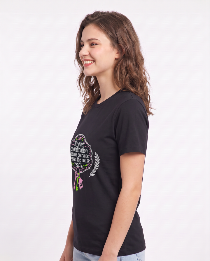 My quiet coordination ensures everyone leaves the house ready. Women's Black T-Shirt product image 3